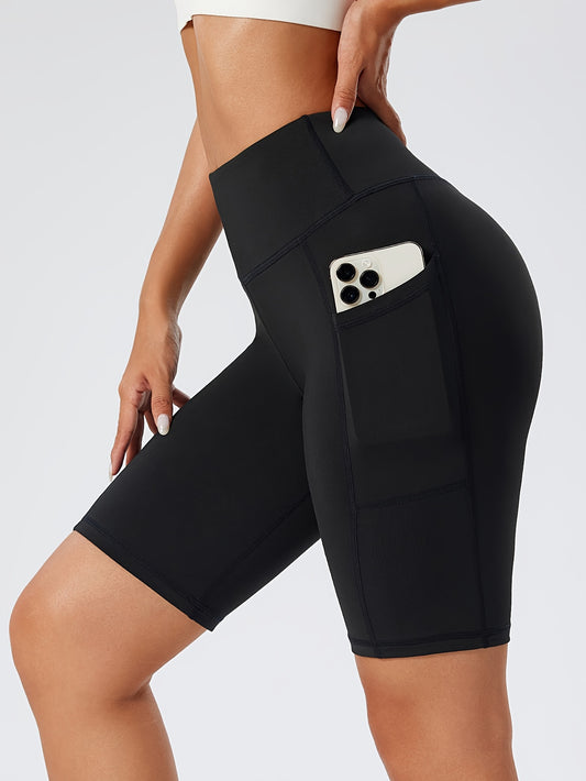 Woman wearing black compression running shorts with side pockets