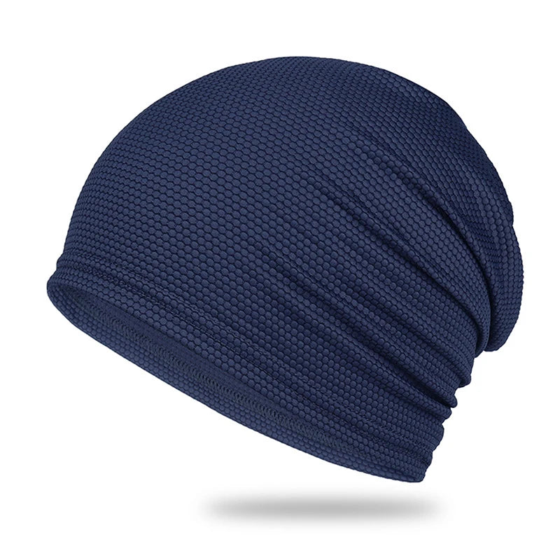 Navy blue textured beanie hat on a white background