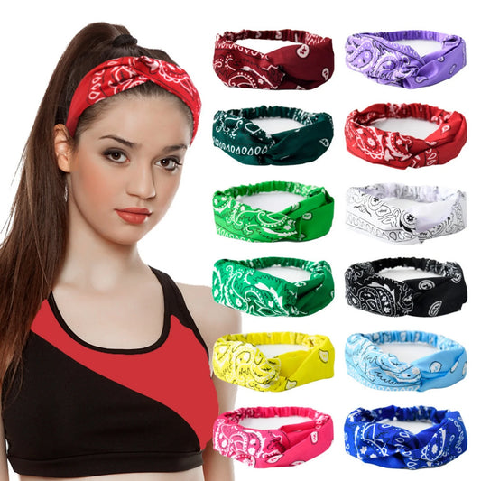 Woman wearing knotted sweat-absorbing running headband